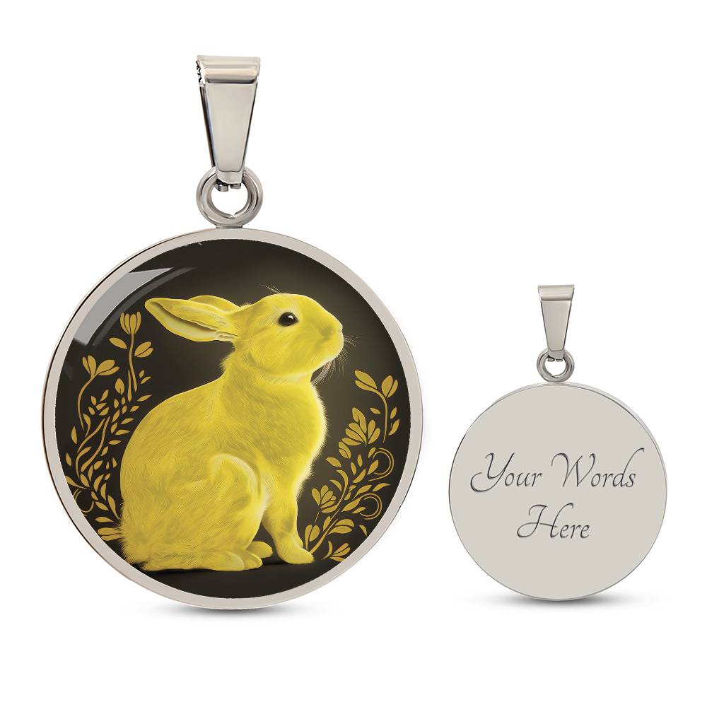 An Elegant silver pendant Rabbit Necklace. Yellow Rabbit and Flowers with a black and brown backdrop. This jewelry offers personalization with an engraving option for a name.