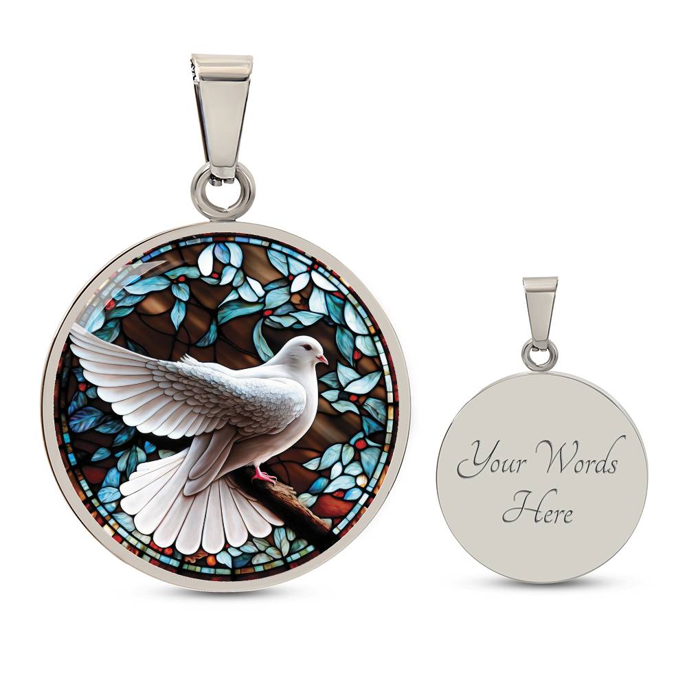 an Elegant silver pendant Dove Bird Necklace. featuring a white dove, green, blue, red colored border, leaves, berries with a brown background. This jewelry offers personalization with an engraving option for a name.