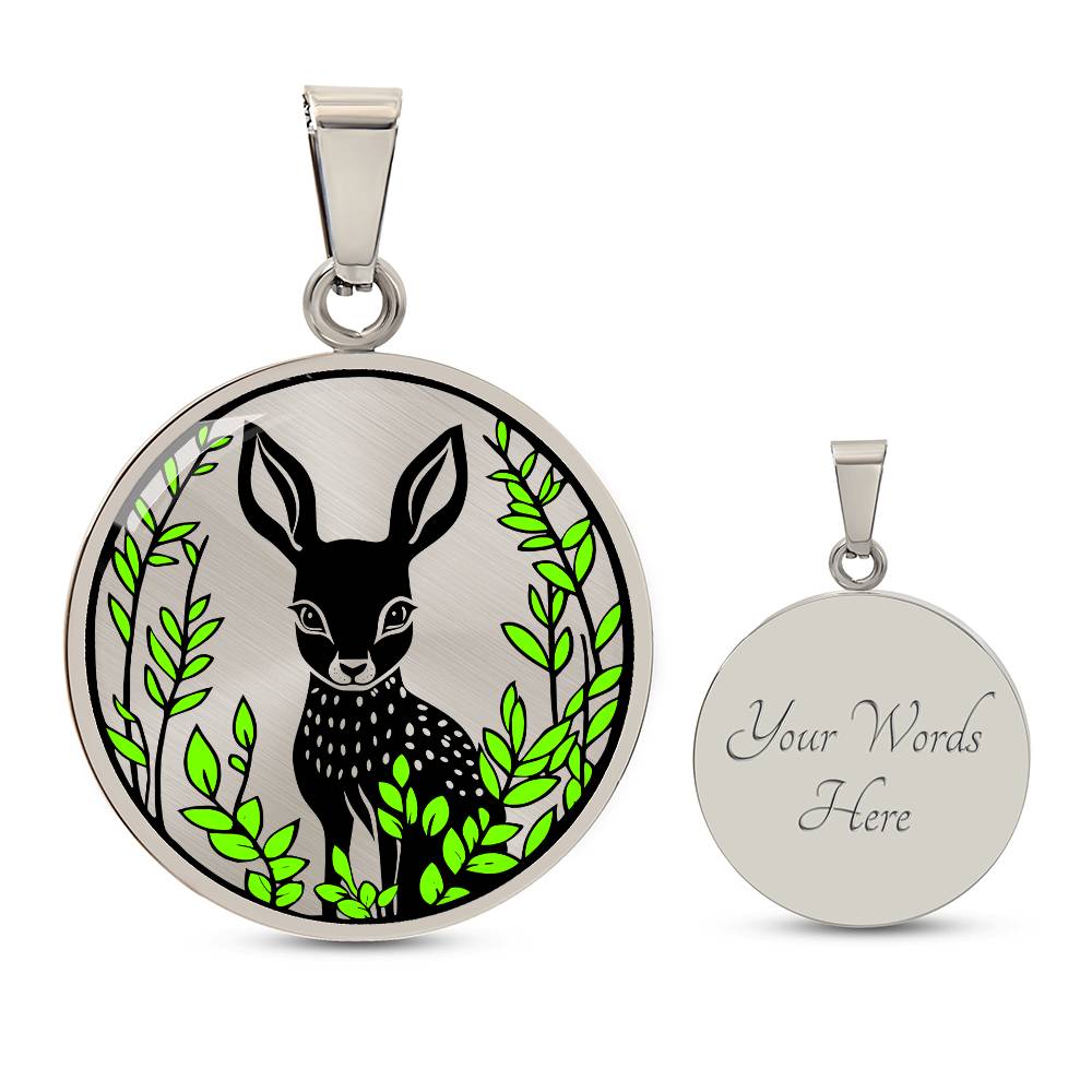 An Elegant silver pendant Deer Necklace. All in Silver and black with green leaves. This jewelry offers personalization with an engraving option for a name.