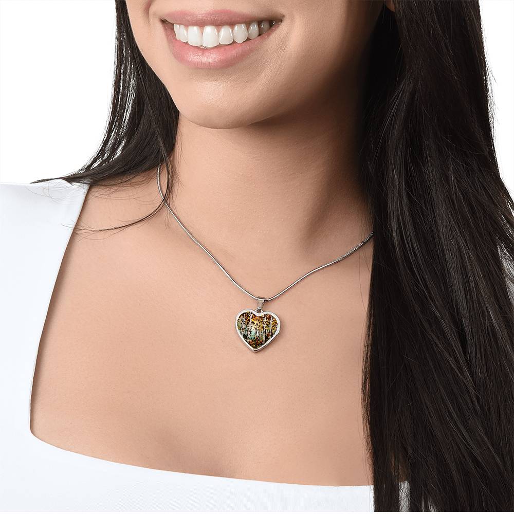 Heart Birch Tree Necklace around a woman's neck