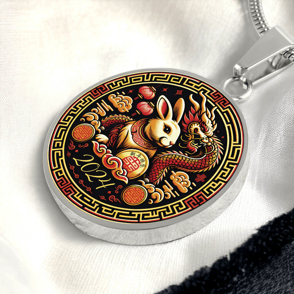 An Elegant silver pendant Year of the Rabbit and Year of the Dragon Necklace. The colors are yellow, Red and Black . This jewelry offers personalization with an engraving option for a name.