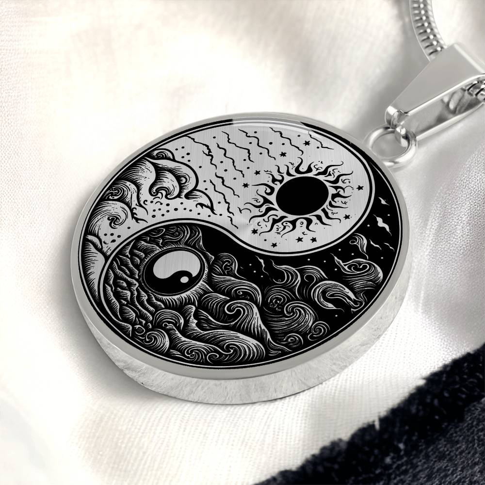 An Elegant silver pendant featuring a vivid Silver and Black Sun and Moon Necklace. This jewelry offers personalization with an engraving option for a name.