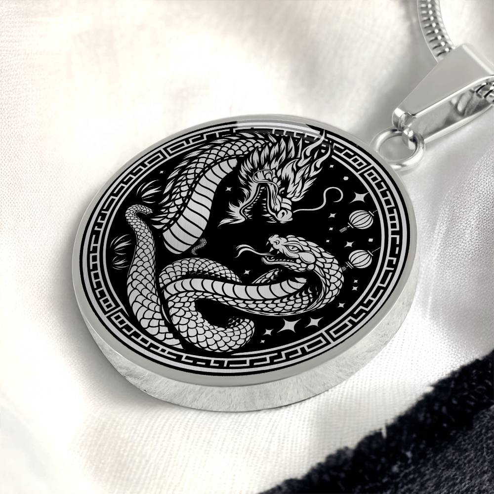 An Elegant silver pendant featuring a Year of the Snake and Year of The Dragon Necklace in silver and black. This jewelry offers personalization with an engraving option for a name.
