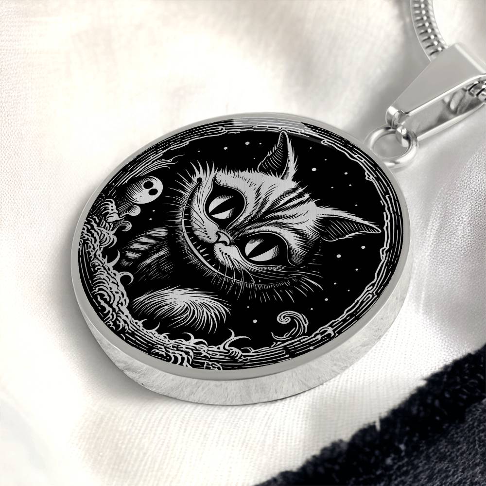 An elegant silver pendant Cheshire Cat Necklace. The colors are gold and black. This necklace offers personalization with an engraving option for a name.