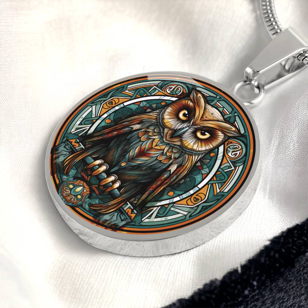 An elegant silver pendant featuring a Celtic Owl Necklace, set against a Green and orange backdrop. This jewelry offers personalization with an engraving option for a name.