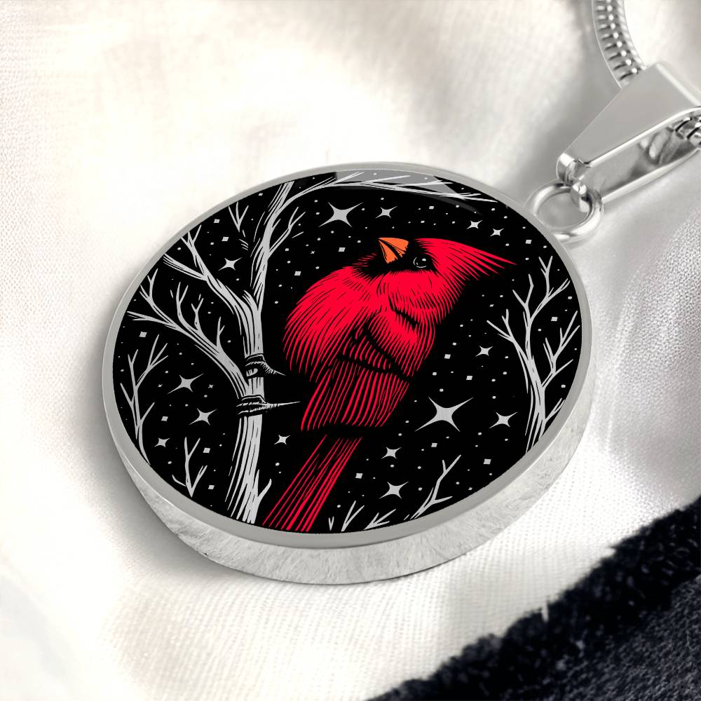 An Elegant silver pendant featuring a vivid Red Northern Cardinal Necklace with Stars and a tree Branch all in a silver and black backdrop. This jewelry offers personalization with an engraving option for a name.