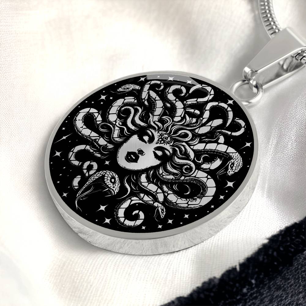 an Elegant silver pendant Medusa necklace with a Silver and Black background. This jewelry offers personalization with an engraving option for a name.
