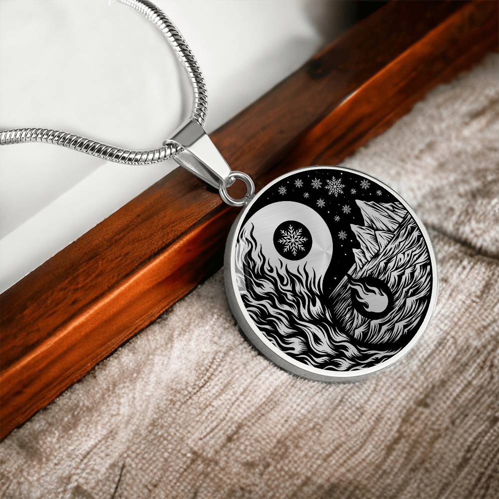 Elegant silver pendant featuring a vivid Silver Fire, Water, snowflakes and Icebergs. set against a Black backdrop. This jewelry offers personalization with an engraving option for a name.