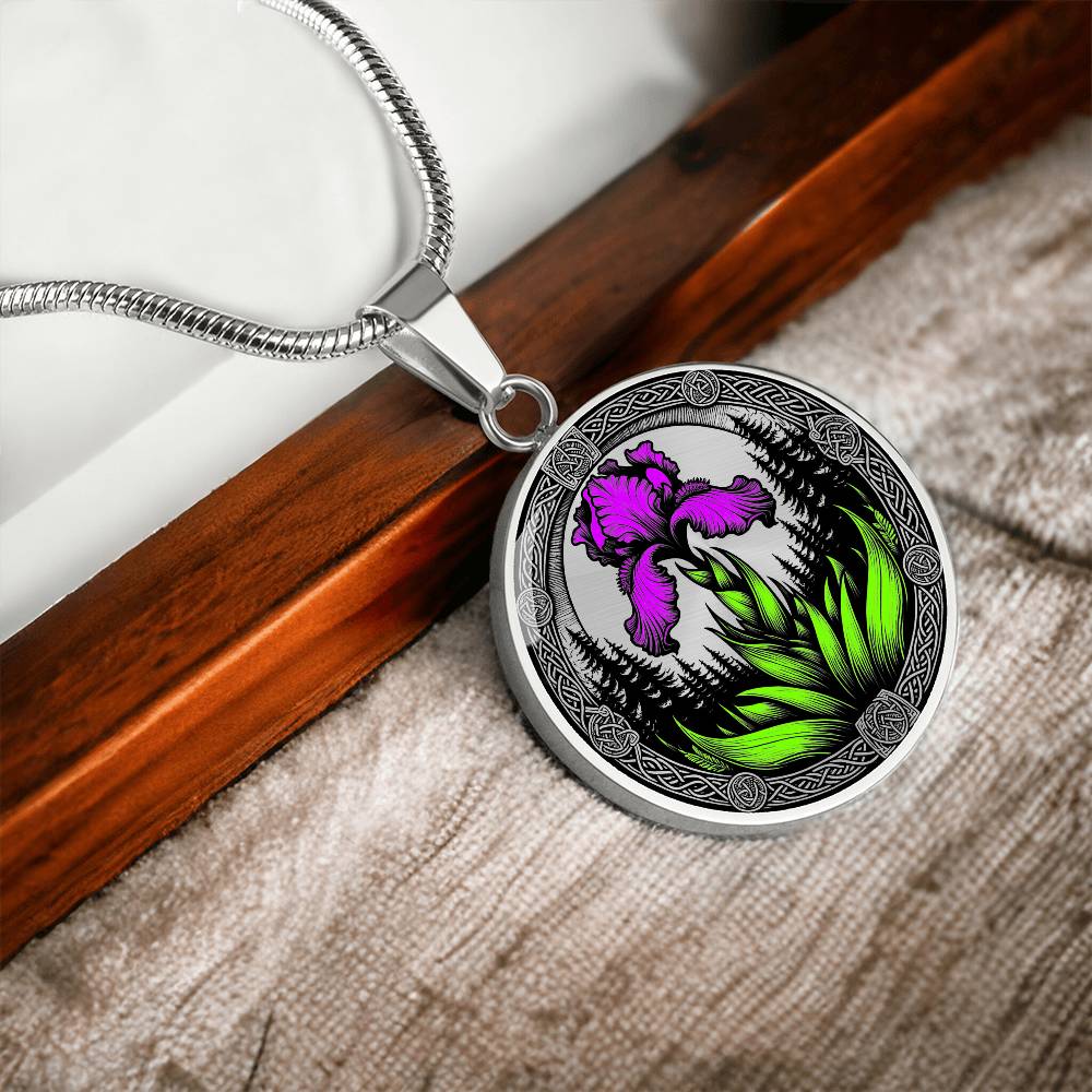 Februarys birth month flower in an Elegant silver pendant necklace featuring a vivid Purple Iris with a gold sun or silver moon surrounded by a forest with a Celtic frame. This necklace offers personalization option for a name.