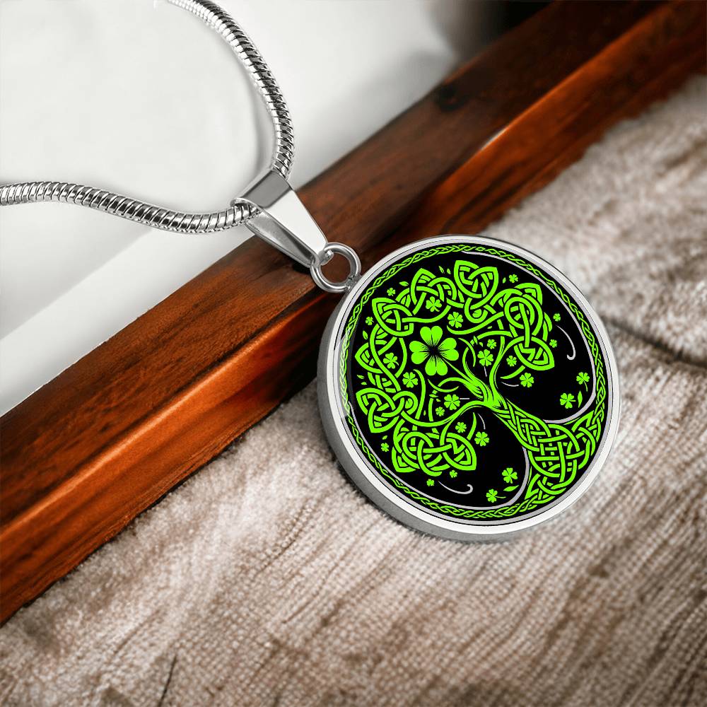 Elegant Silver pendant featuring a vivid Green Celtic four leaf Clover Tree of Life Necklace, set against a Black & silver backdrop. This jewelry offers personalization with an engraving option for a name.