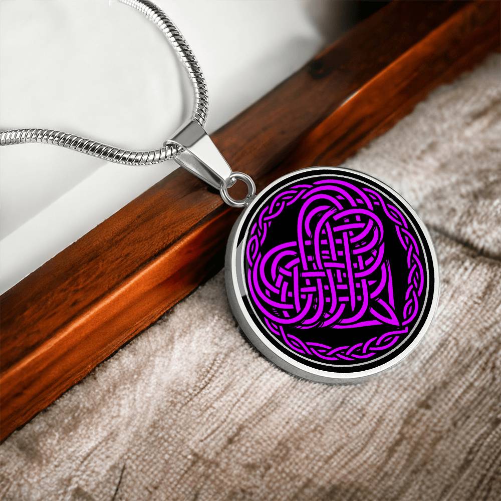Elegant silver pendant featuring a vivid purple Heart Celtic Necklace set against a Black & silver backdrop. This jewelry offers personalization with an engraving option for a name.