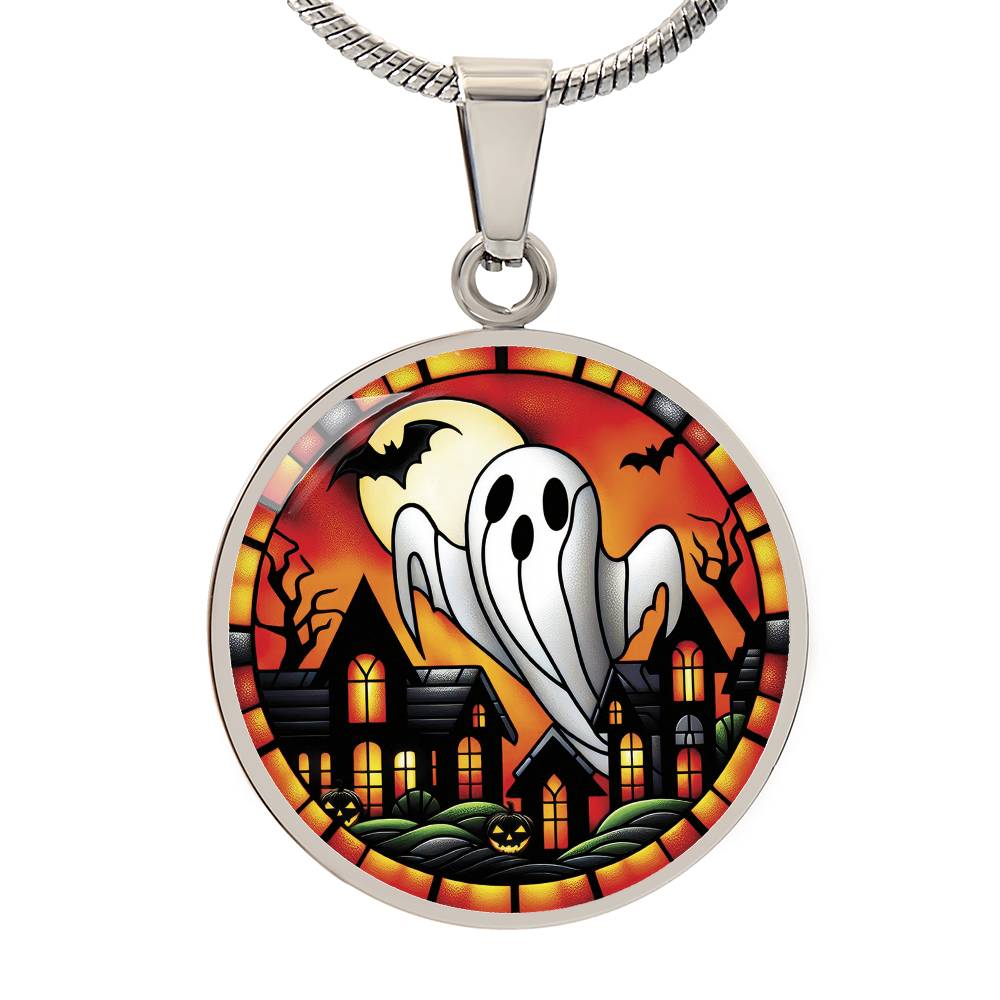 An elegant silver pendant Halloween Ghost Necklace. The colors are white, black, yellow, orange and green. This jewelry offers personalization with an engraving option for a name.