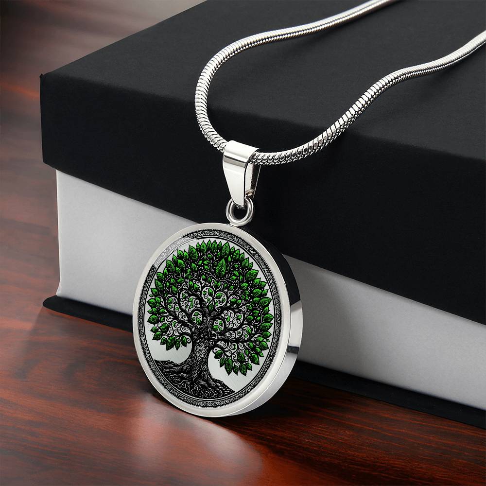 Gift box with an Elegant silver pendant Celtic Tree of Life Necklace. Colors are black, silver and Green Leaves. This jewelry offers personalization with an engraving option for a name.
