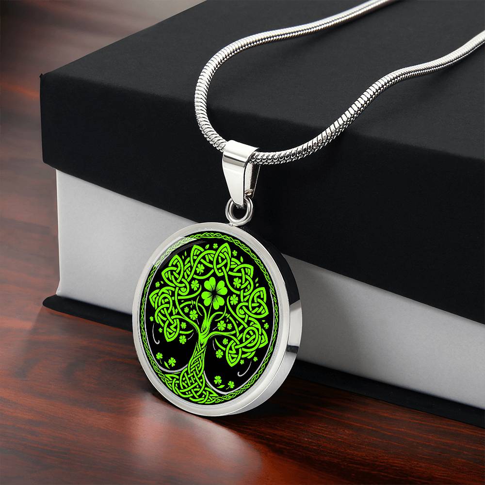 Gift box with an Elegant Silver pendant featuring a vivid Green Celtic four leaf Clover Tree of Life Necklace, set against a Black & silver backdrop. This jewelry offers personalization with an engraving option for a name.
