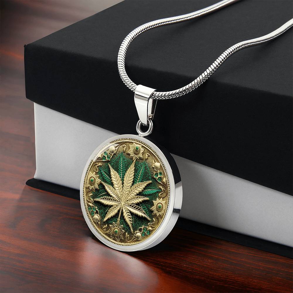 Gift box with an Elegant silver pendant Weed Leaf necklace featuring a Green and Gold Marijuana Leaf. This jewelry offers personalization with an engraving option for a name.