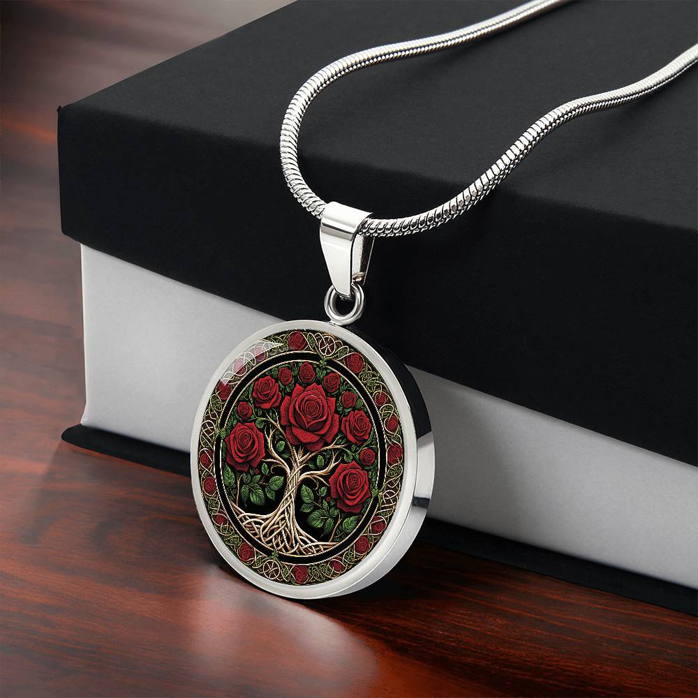 Gift box with an elegant silver pendant Rose Tree of Life Necklace. The Colors are red, green, white and black. This jewelry offers personalization with an engraving option for a name.