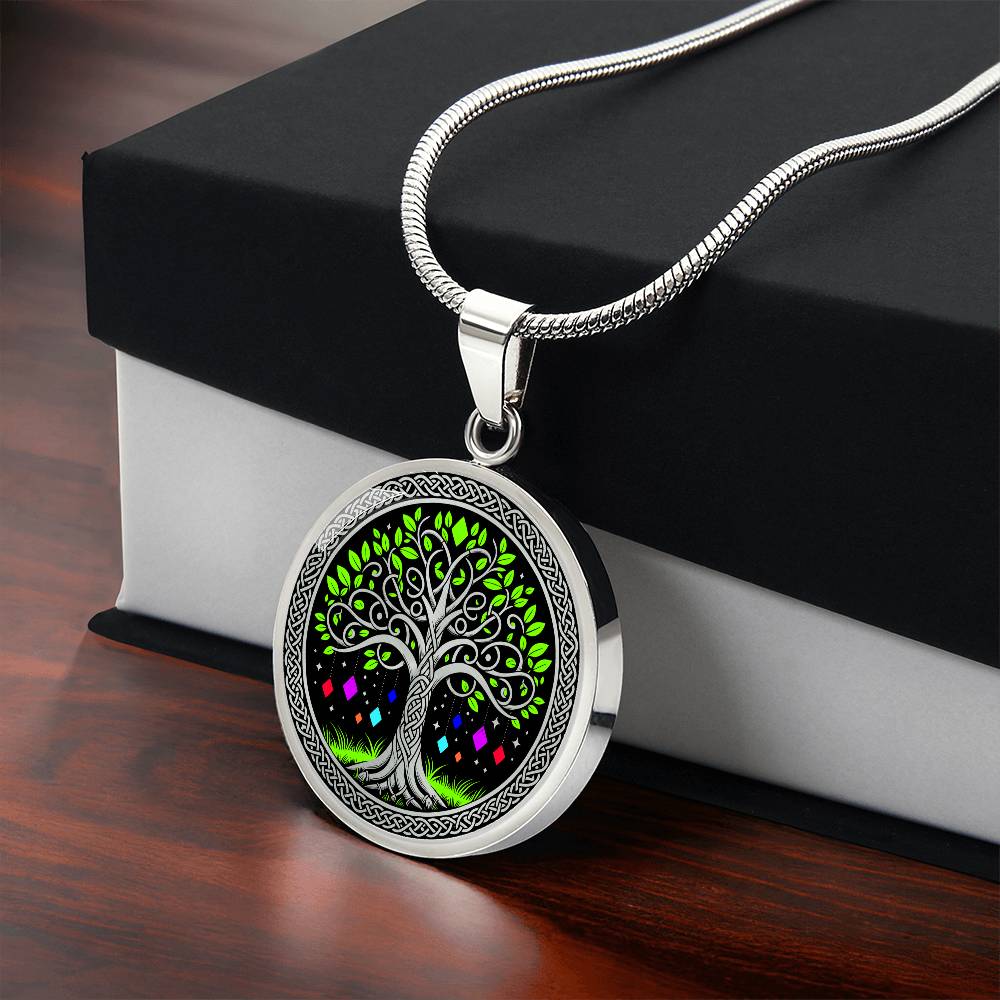 an Elegant silver pendant Tree of Life necklace featuring a vivid Celtic Green and silver tree, set against a black backdrop with red,blue,purple,orange gems. This jewelry offers personalization with an engraving option for a name.