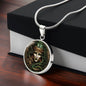 Gift box with an Elegant silver pendant Medusa necklace. The colors are green hair, white skin, brown background. This jewelry offers personalization with an engraving option for a name.