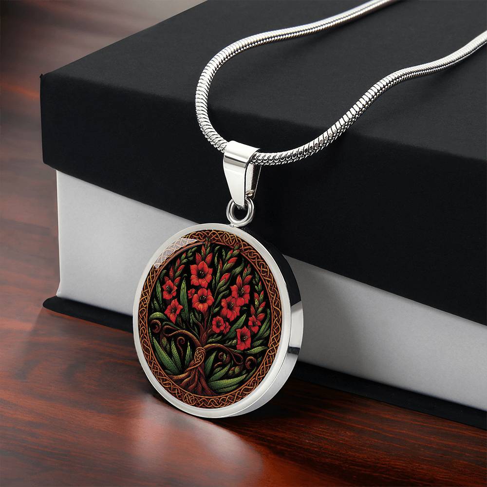Gift box with an elegant silver pendant Gladiolus Tree of Life Necklace. The Colors are red, green, brown and black. This jewelry offers personalization with an engraving option for a name.