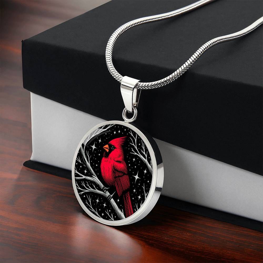 Gift box with An Elegant silver pendant featuring a vivid Red Northern Cardinal Necklace with Stars and a tree Branch all in a silver and black backdrop. This jewelry offers personalization with an engraving option for a name.