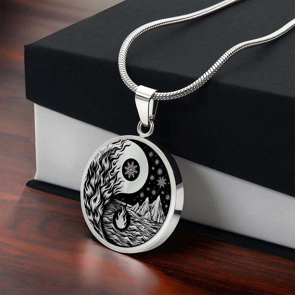 Gift box with An Elegant silver pendant featuring a vivid Silver Fire, Water, snowflakes and Icebergs. set against a Black backdrop. This jewelry offers personalization with an engraving option for a name.