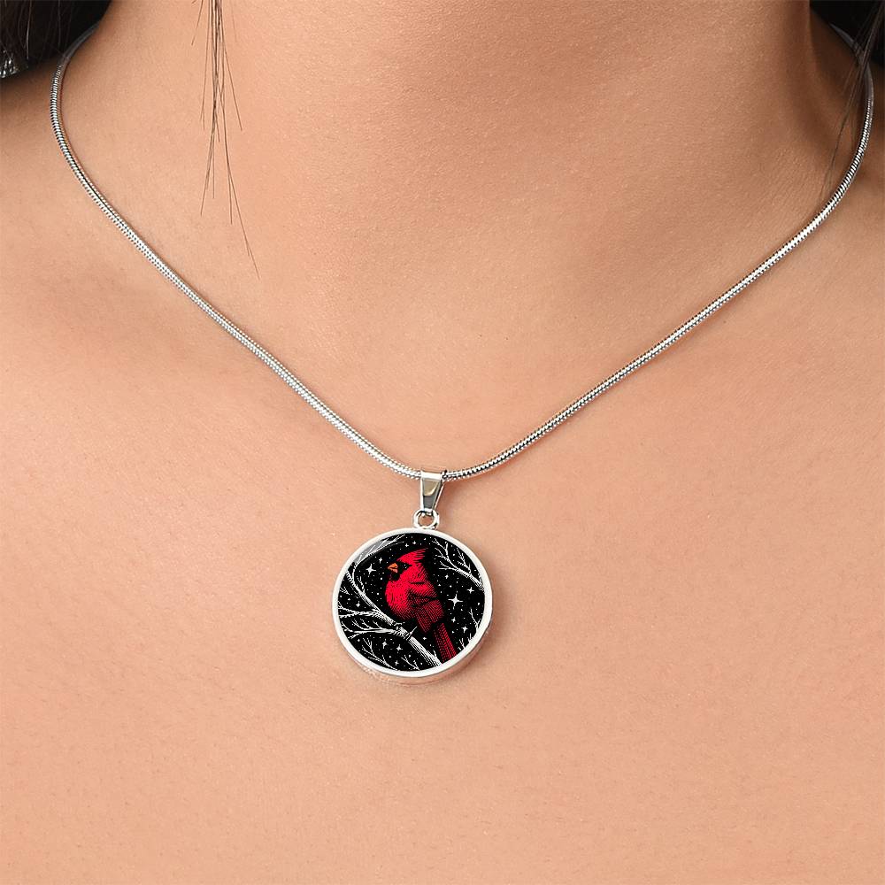 Woman wearing An Elegant silver pendant featuring a vivid Red Northern Cardinal Necklace with Stars and a tree Branch all in a silver and black backdrop. This jewelry offers personalization with an engraving option for a name.
