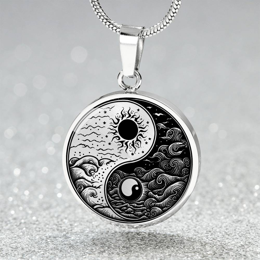 An Elegant silver pendant featuring a vivid Silver and Black Sun and Moon Necklace. This jewelry offers personalization with an engraving option for a name.
