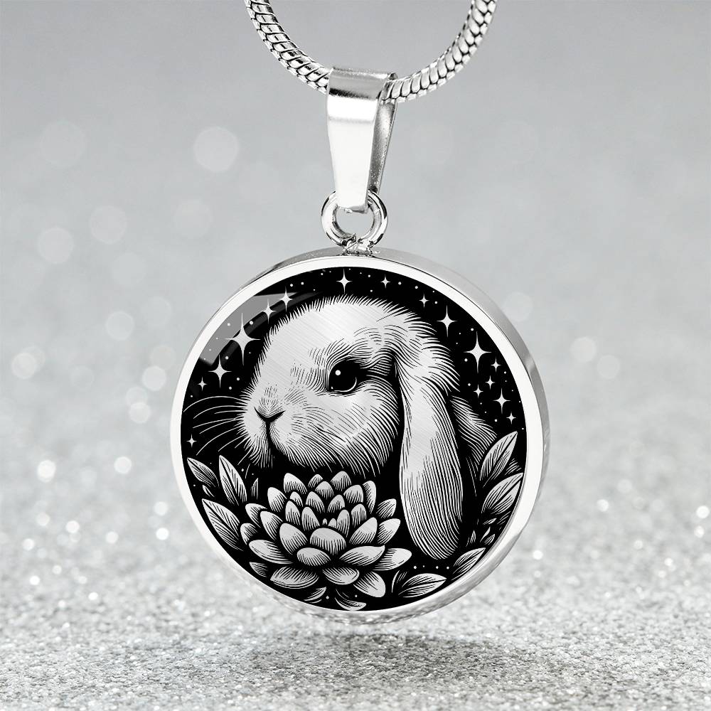 Elegant silver pendant Water Lily Bunny necklace. Colors are silver with a black background. This jewelry offers personalization with an engraving option for a name.