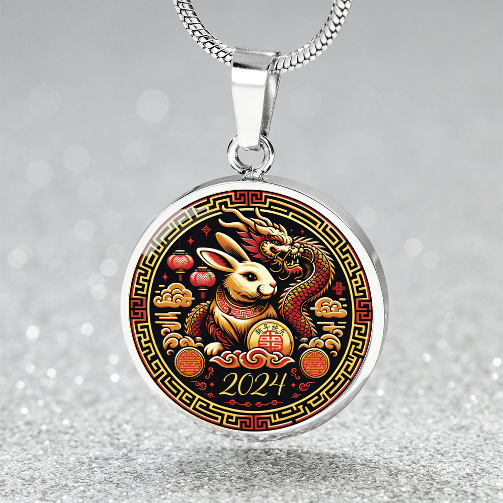 An Elegant silver pendant Year of the Rabbit and Year of the Dragon Necklace. The colors are yellow, Red and Black . This jewelry offers personalization with an engraving option for a name.
