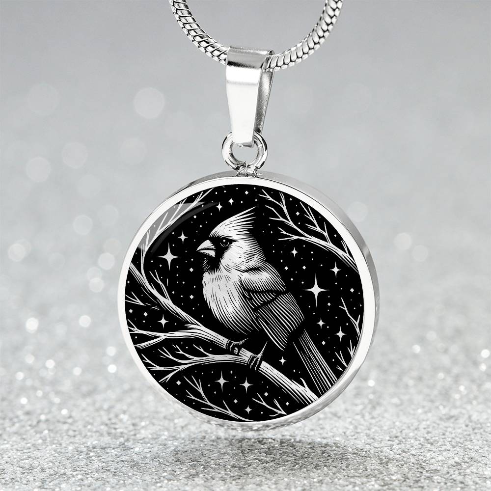 An Elegant silver pendant featuring a vivid Silver Northern Cardinal Necklace with Stars and a tree Branch all in a silver and black backdrop. This jewelry offers personalization with an engraving option for a name.
