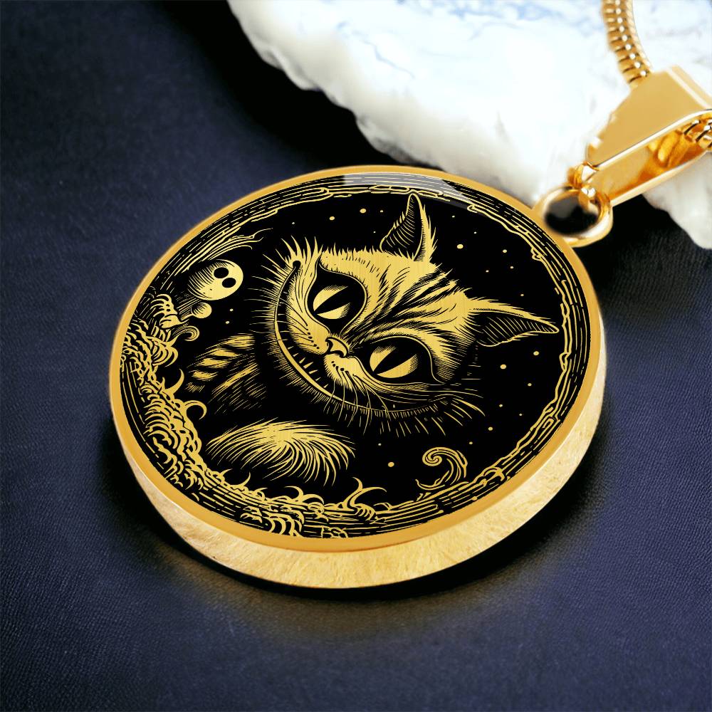 An elegant gold pendant Cheshire Cat Necklace. The colors are gold and black. This necklace offers personalization with an engraving option for a name.