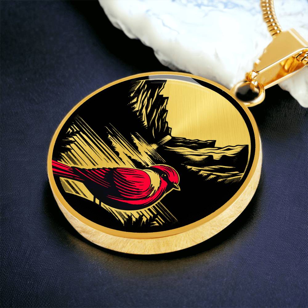 An elegant gold pendant Red Cardinal Necklace. The colors are gold, red and black. This jewelry offers personalization with an engraving option for a name.
