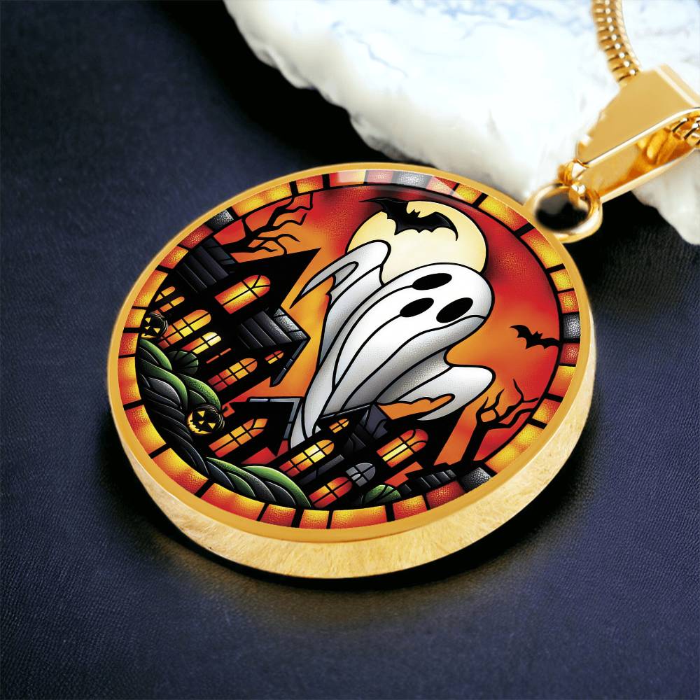 an elegant gold pendant Halloween Ghost Necklace. The colors are white, black, yellow, orange and green. This jewelry offers personalization with an engraving option for a name.
