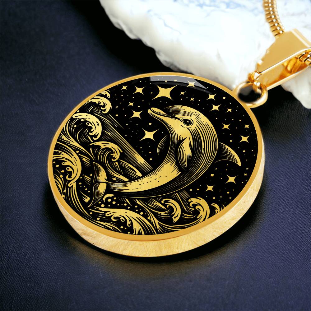 an Elegant gold pendant featuring a vivid gold Dolphin Necklace with a Stars and Ocean Waves set against a gold and black backdrop. This jewelry offers personalization with an engraving option for a name.