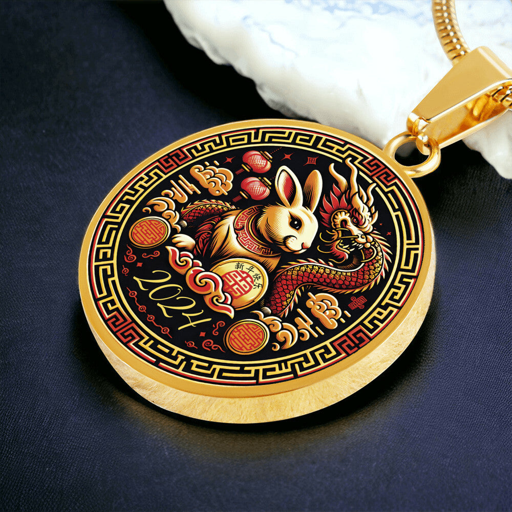 An Elegant gold pendant Year of the Rabbit and Year of the Dragon Necklace. The colors are yellow, Red and Black . This jewelry offers personalization with an engraving option for a name.