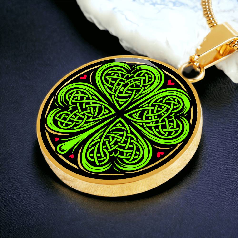 Elegant gold pendant necklace featuring a vivid Celtic four leaf clover with four red & Green hearts, set against a subtle Black & gold backdrop. This jewelry offers personalization with an engraving option for a name.