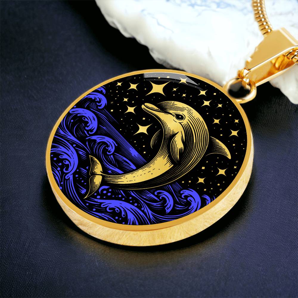 an Elegant gold pendant featuring a vivid gold Dolphin Necklace with a Stars and Ocean Waves set against a gold and black backdrop. This jewelry offers personalization with an engraving option for a name.