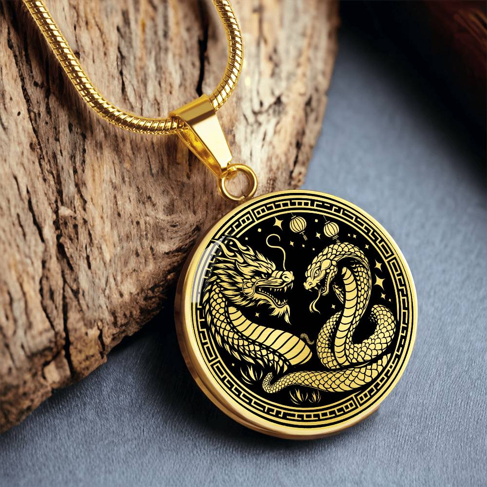 An Elegant gold pendant featuring a Year of the Snake and Year of The Dragon Necklace in gold and black. This jewelry offers personalization with an engraving option for a name.
