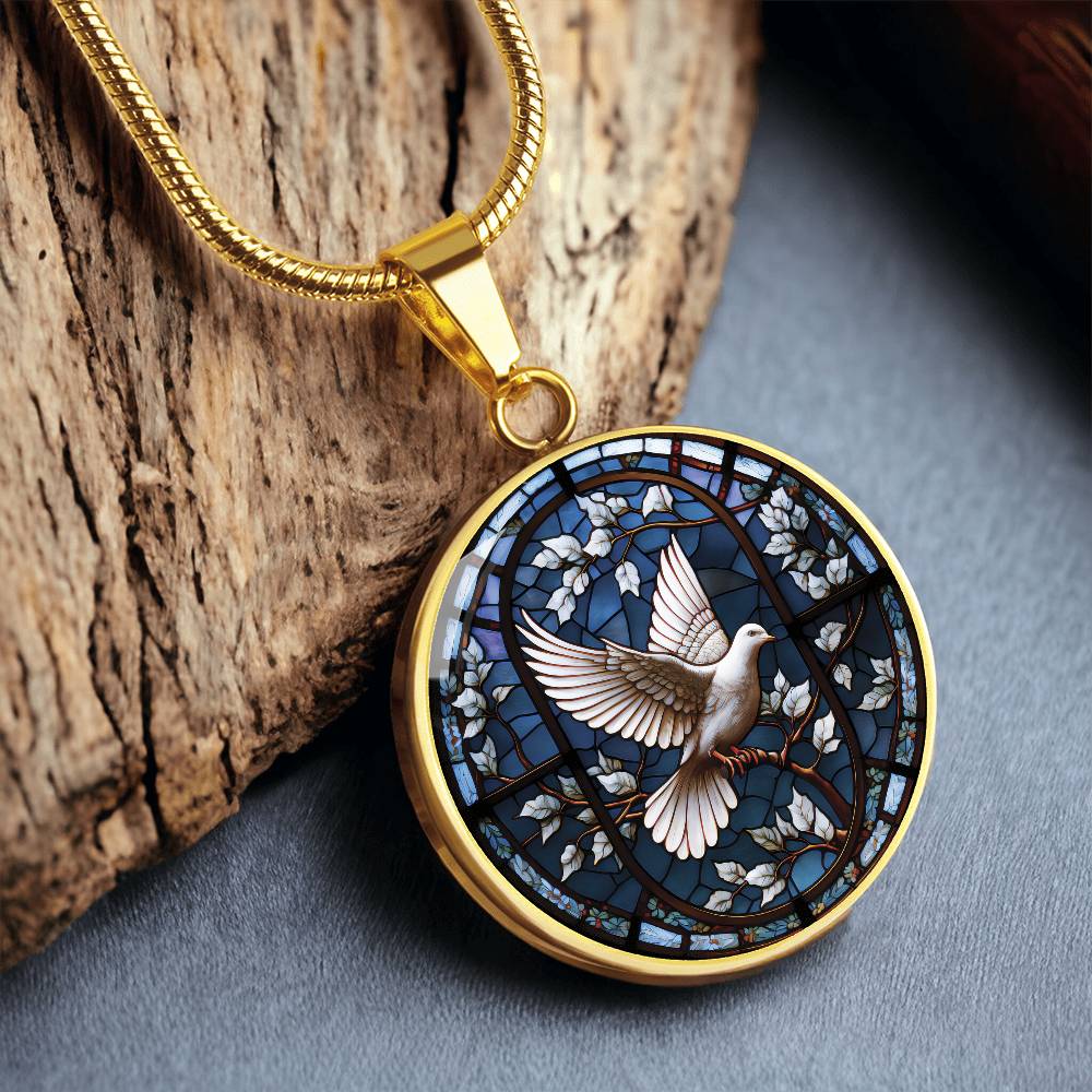 An elegant gold pendant White Dove Necklace. The Colors are white, brown and blue This jewelry offers personalization with an engraving option for a name.