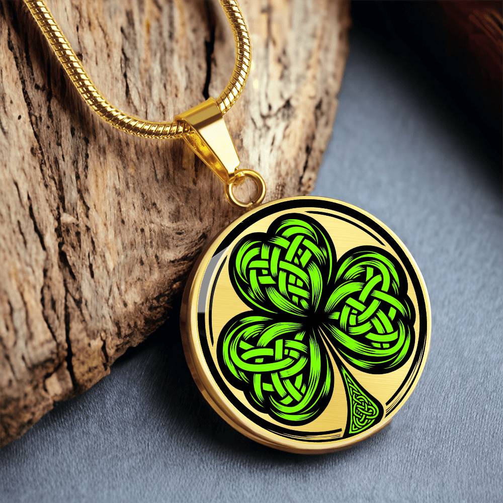 Elegant gold pendant necklace featuring a vivid Green Celtic Clover set against a Gold & black backdrop. This necklace offers personalization with an engraving option for a name.