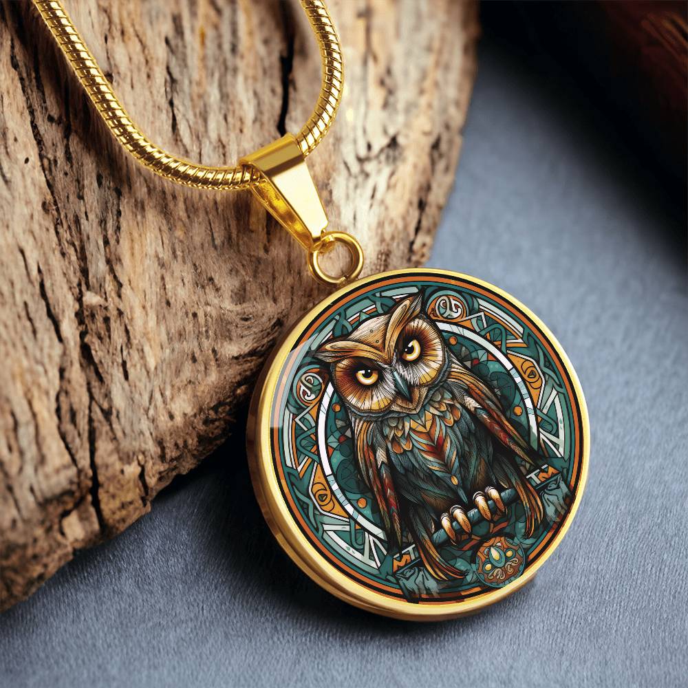 An elegant gold pendant featuring a Celtic Owl Necklace, set against a Green and orange backdrop. This jewelry offers personalization with an engraving option for a name.