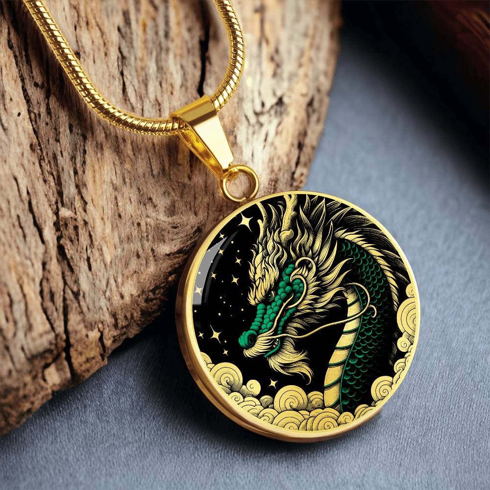 an Elegant gold pendant Chinese Dragon necklace featuring a vivid Jade dragon with stars and clouds set against a black backdrop. This jewelry offers personalization with an engraving option for a name.