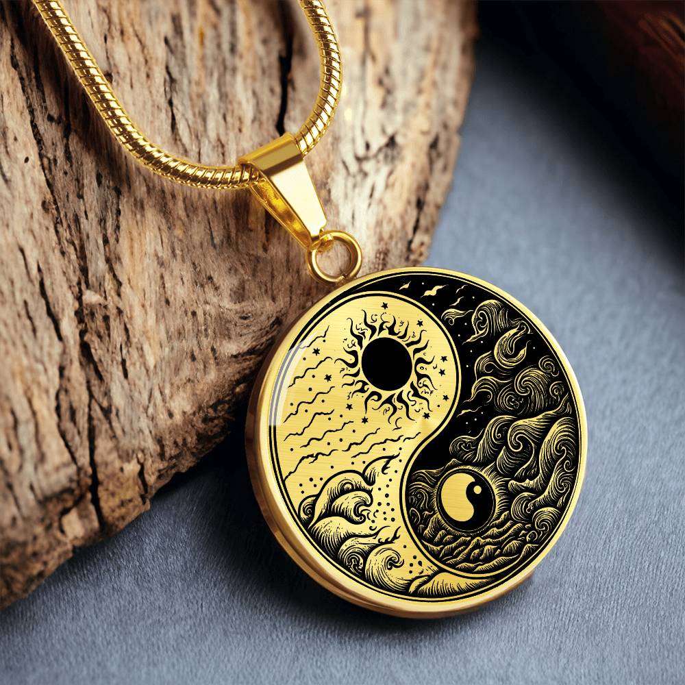 An Elegant gold pendant featuring a vivid gold and Black, Sun and Moon Necklace. This jewelry offers personalization with an engraving option for a name.
