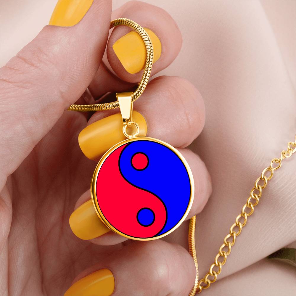 Woman holding a Gold Pendant Fire and Ice Yin Yang Necklace