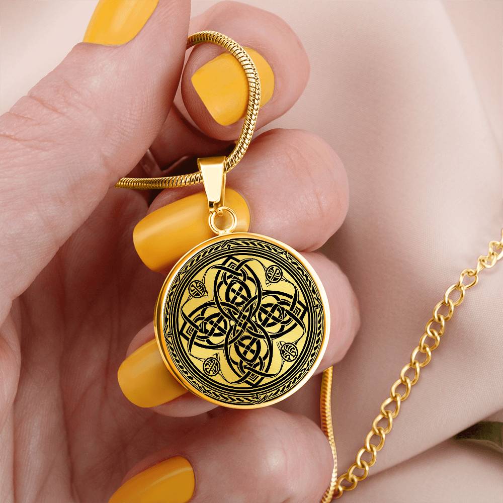 Witches Knot Necklace in a woman's hand