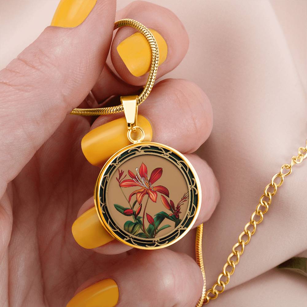 Woman holding an Elegant gold pendant Honeysuckle Necklace, Junes birth month flower, Colors are Tan, Red, Green and black. This necklace offers personalization with an engraving option for a name.