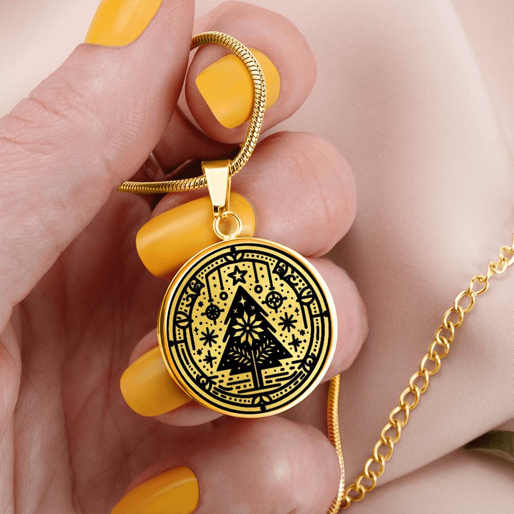 Woman holding an Elegant gold pendant necklace featuring a Winter Christmas theme with a Tree set against a gold backdrop. This necklace offers personalization with an engraving option for a name.
