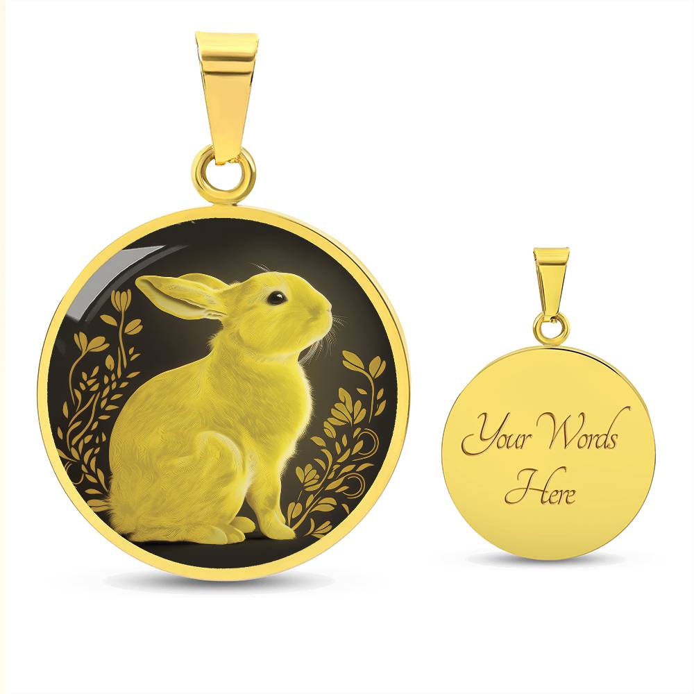 An Elegant gold pendant Rabbit Necklace. Yellow Rabbit and Flowers with a black and brown backdrop. This jewelry offers personalization with an engraving option for a name.