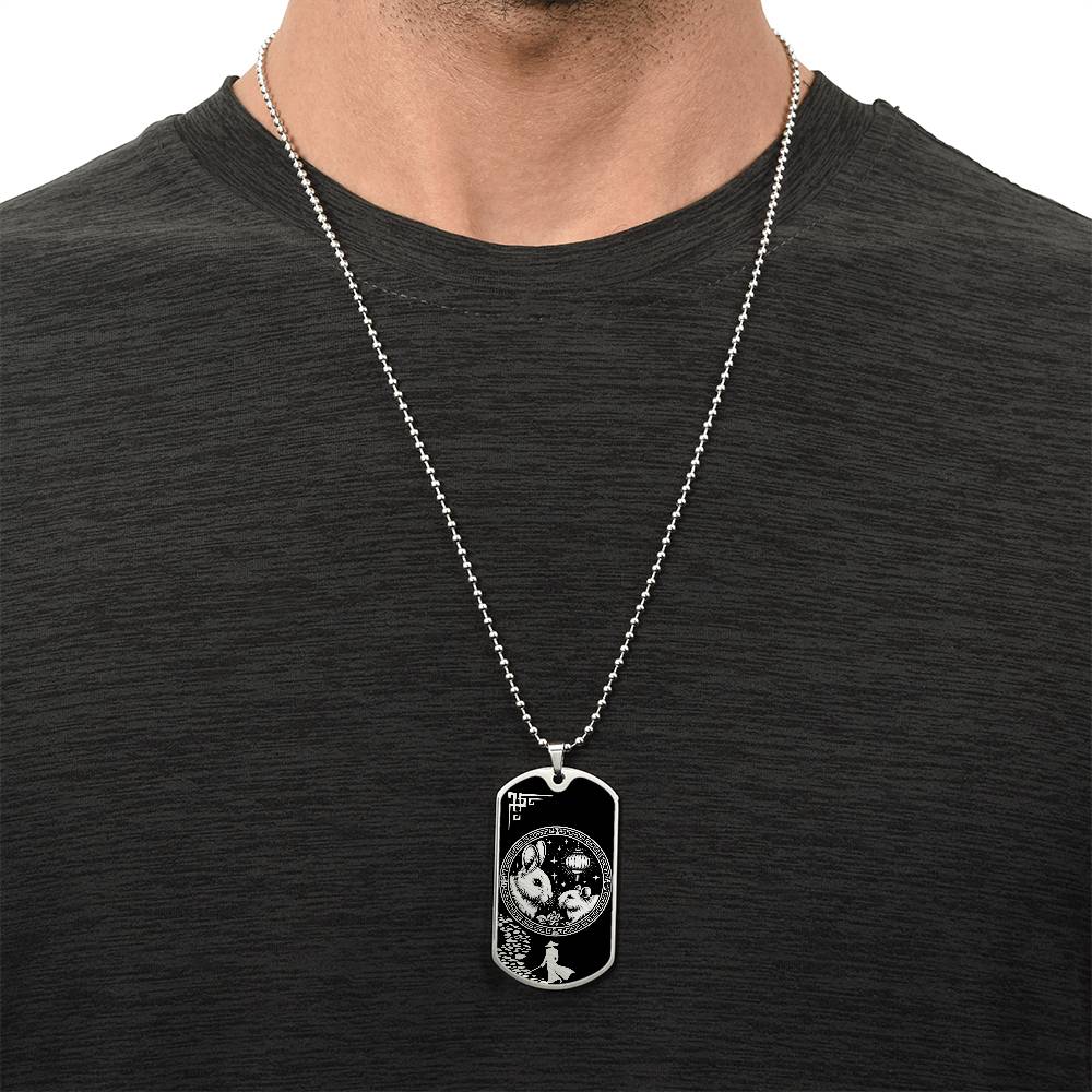 Man wearing an elegant Silver pendant Rat and Year of The Rabbit Necklace. Colors are silver and black. This jewelry offers personalization with an engraving option for a name.