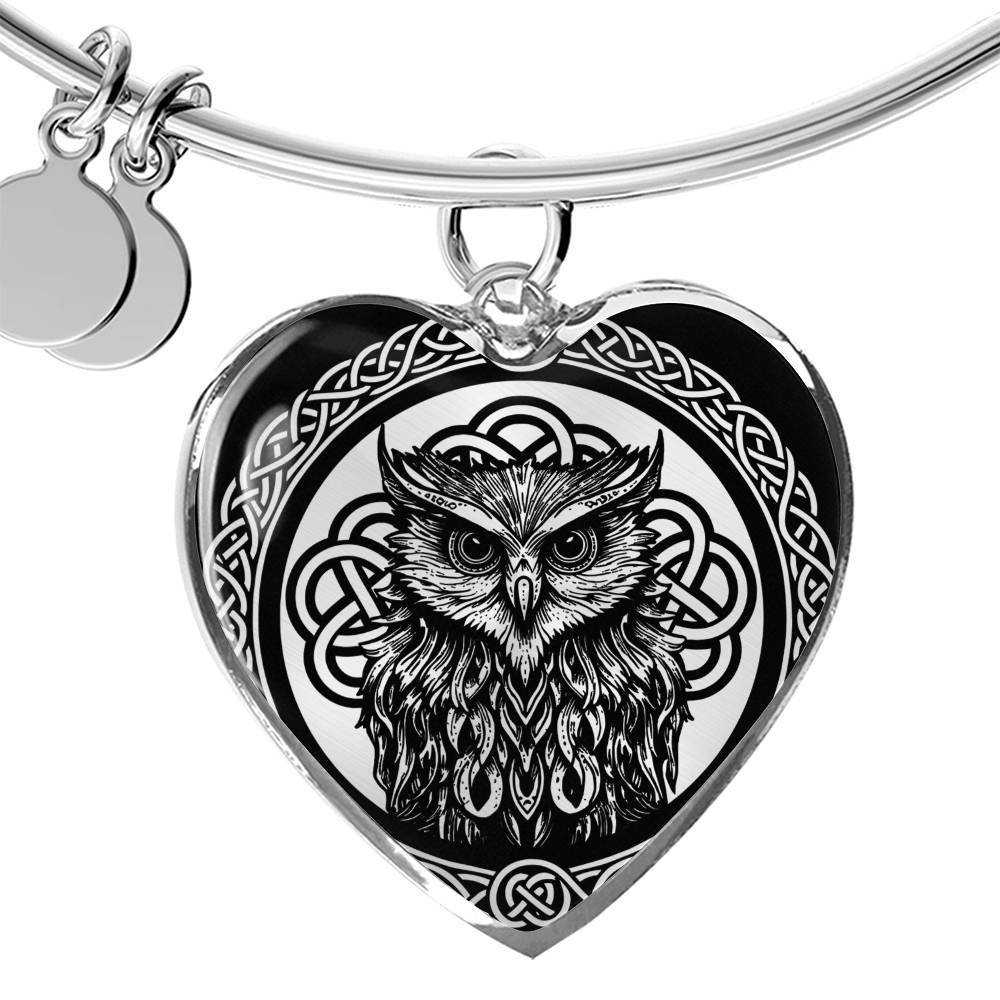 an elegant silver pendant Celtic Owl Bracelet. Colors are silver and black. This jewelry offers personalization with an engraving option for a name.